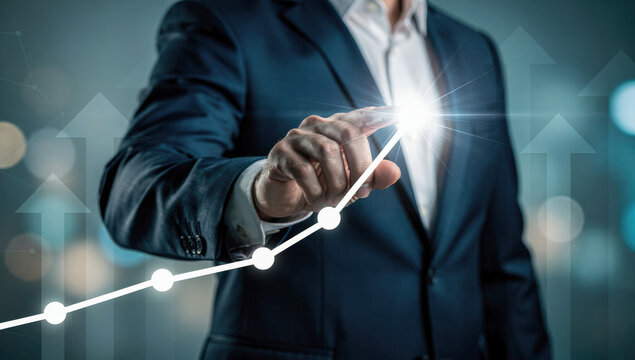 Businessman touching upward trending graph on digital interface showing business growth and success