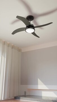 Modern Black Ceiling Fan Rotating in Bright Minimalist Room, Vertical 4K Video