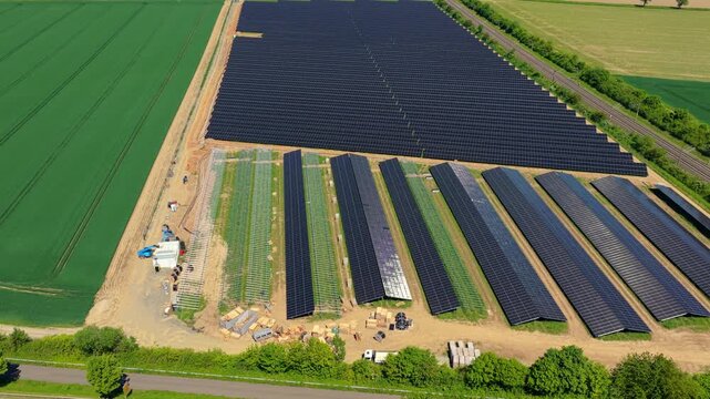 Solar Farm Aerial Flight Left to Right Green Rural Landscape