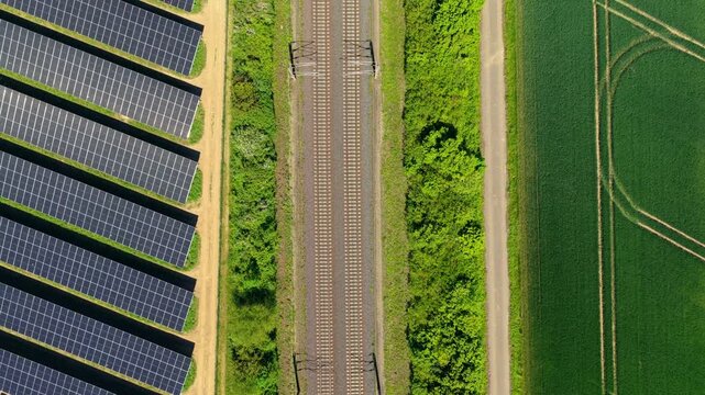 Aerial Solar Farm Railway Tracks Green Rural Landscape