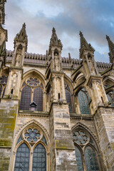 Fototapeta premium The Cathedral of Our Lady of Reims is a Catholic cathedral in the French city of Reims, in the Marne department, in the northeast of the country. The church is dedicated to Our Lady, the Virgin Mary.