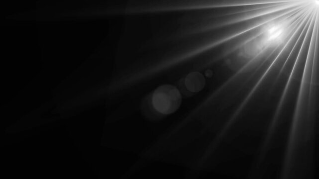High quality stock footage of sun rays. Overlays light transition effects sunlight lens flare light leaks. Centered white light beams on black background animation. glow white optical shine light