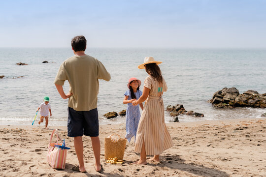 Family having a good time at beach 
