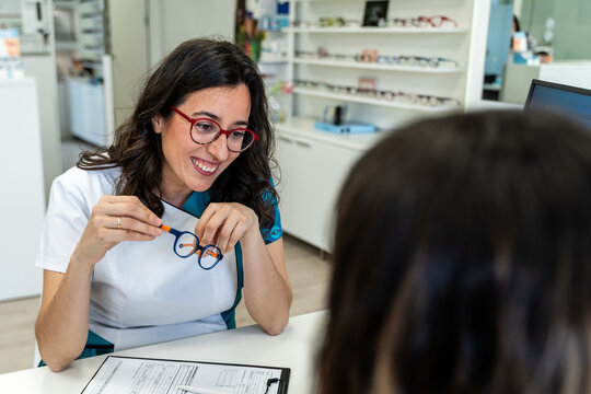 Optometrist Smiling During Consultation