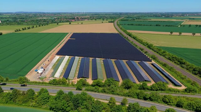Solar Farm Aerial Zoom In Large Scale Green Landscape