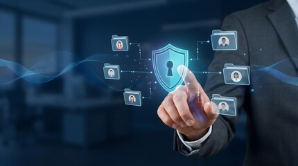 Fototapeta premium Businessman touching digital shield with keyhole and user folders