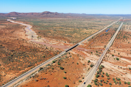 Flooding under the Indian Pacific Railway. Paratoo Creek. Australia.