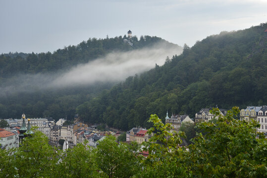 Watchtower Perched on Forest Hills over Historic Buildings in Spa Town Karlovy Vary, Czech Republic