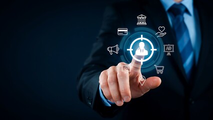 Fototapeta premium Businessman selecting customer target icon on digital interface for marketing strategy