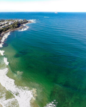 Aerial drone view of the beautiful coastline and blue ocean in Sunshine Coast, Queensland, Australia