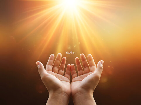 Two open hands reaching up towards bright golden sun rays light