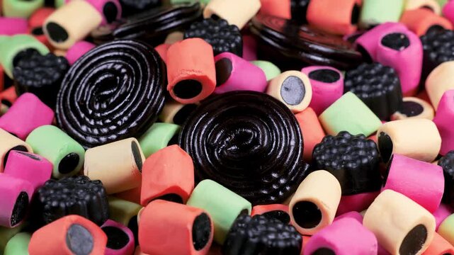 Assorted Licorice Candies Rotating Macro Background