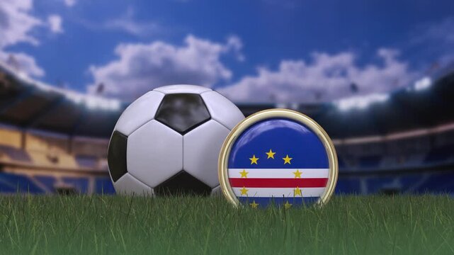 A football "soccer" ball rotating behind a badge displaying the Cabo Verdean flag on the grass of a playing field.  4K loopable video.