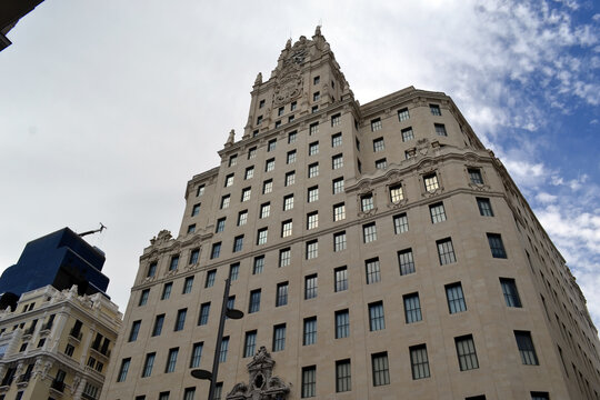 MADRID, SPAIN - JUNE, 4, 2026. Low angle view of the telefonica building on madrid gran via showing facade and tower for architectural background and poster design