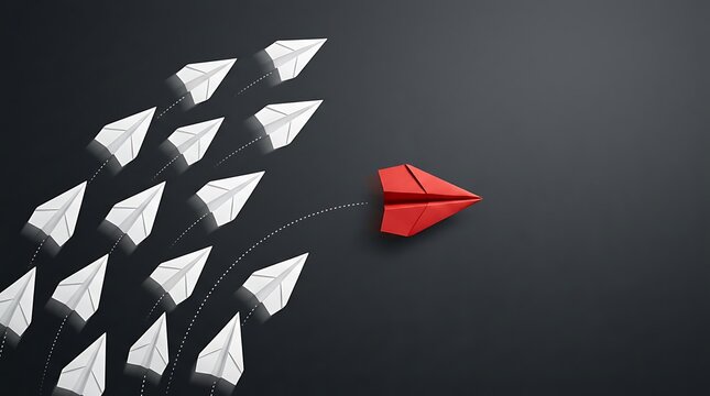 Bold red paper airplane breaking away from the crowd, illustrating leadership, innovation, and embracing a unique, individual path.