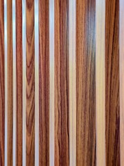 Obraz premium Close-up of modern wooden slat wall background with natural grain texture for interior design and architectural decoration