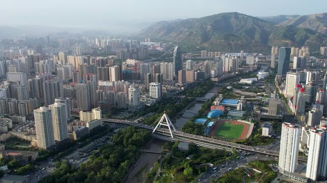 Aerial view of Lanzhou city skyline with river and mountains, China in Lanzhou, China