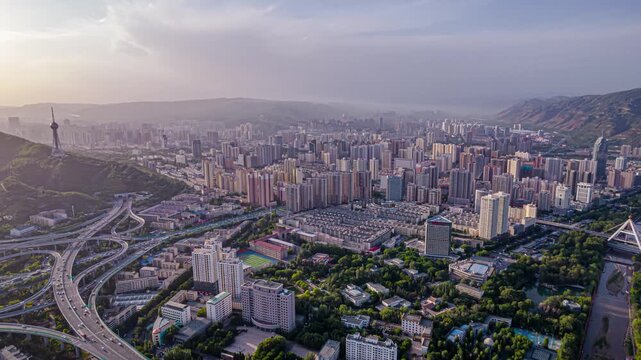 Aerial panorama of Lanzhou skyline with highways and mountains, Gansu, China in Lanzhou, Gansu, China