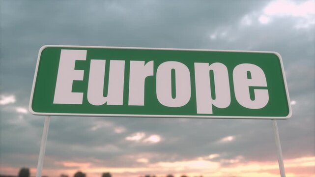 Green Europe Road Sign Against Dramatic Cloudy Sunset Sky