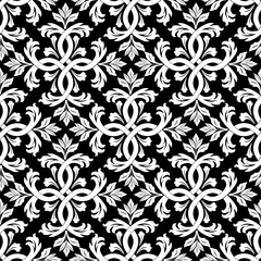 Fototapeta premium seamless continuous pattern of stylized crosses with floral ornaments in a black on a lilac background.ai