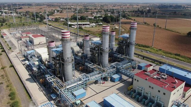 Aerial view of industrial power plant motion footage showing infrastructure