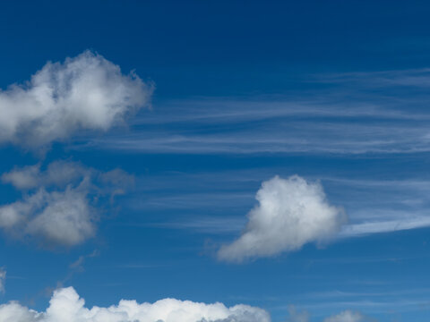 clouds in a bright blue  sky