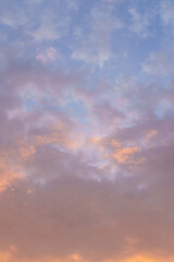 Obraz premium Sky filled with clouds during sunrise pastel gradient blue pink purple orange serene atmosphere