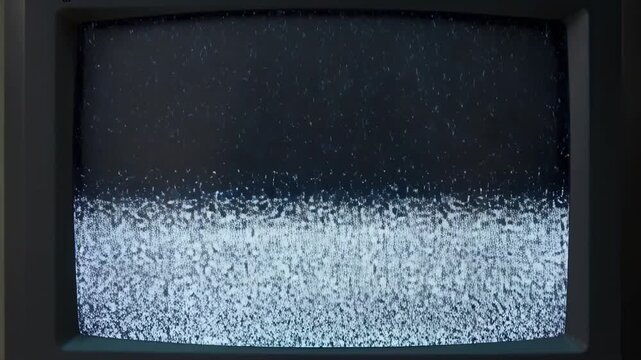 Vintage television static transitioning to clear screen: retro tech vibes in motion