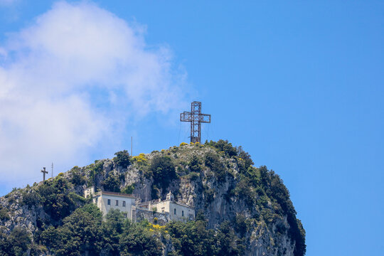 The Majestic Mountain Summit Cross and Ancient Hermitage of Monte San Liberatore (Eremo di San Liberatore) in Salerno, Italy.