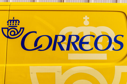 Barcelona, Spain-June 12, 2026. Yellow correos postal delivery van close up
