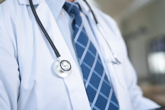 Doctor with Stethoscope in Professional Attire in Medical Setting