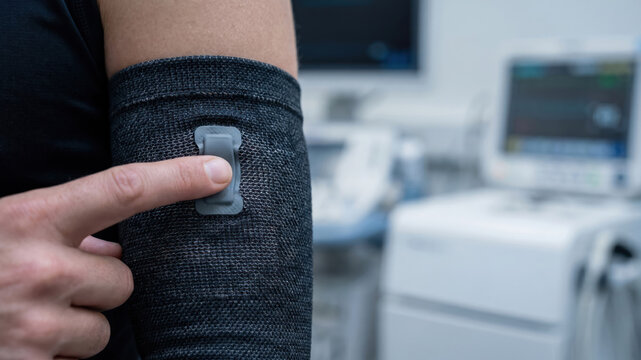 Smart Fabric Sensor Tapping on Bicep for Monitoring Tiny Muscle Activity