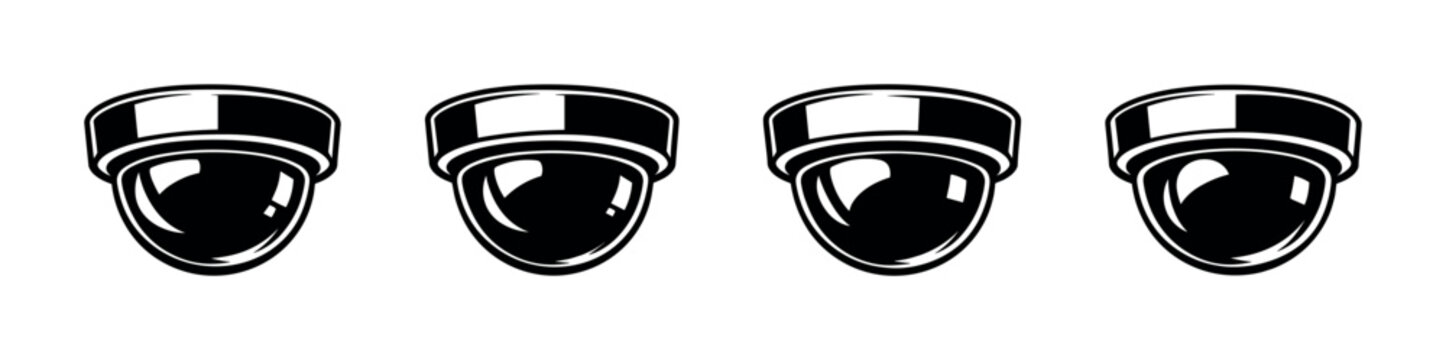 Set of four black and white dome security cameras in a row