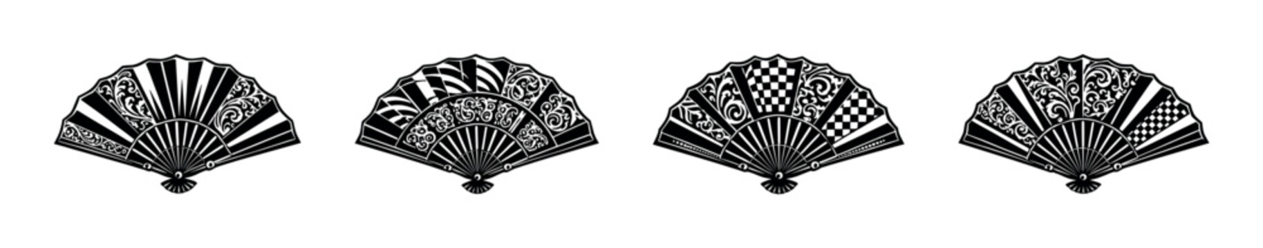 Collection of four ornate black and white folding fans with intricate patterns