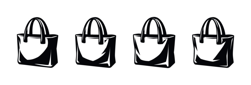 Collection of four identical black tote bags with handles on a white background