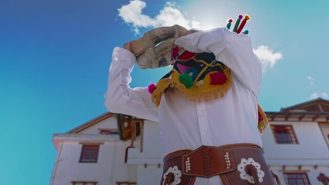 Aya Huma making traditional dancing at Inti Raymi Celebration in Otavalo - Ecuador.