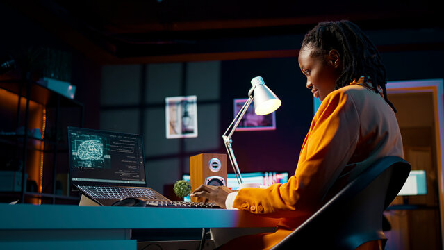 African American system engineer using AI system to write computer program code, HTML terminal window, woman works with deep learning algorithms, artificial intelligence neural networks.