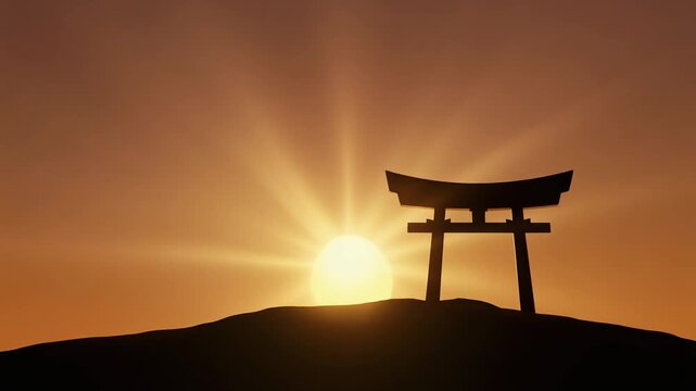 Silhouette of a traditional Japanese torii gate standing on a hill against a bright sunset.
