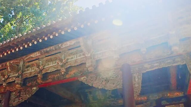 Taiyun, China - May 7 2026: Historic pavilion fa&ccedil;ade of Jinci, showcasing elegant timber architecture, intricate Dougong brackets, and the enduring beauty of traditional Chinese temple design