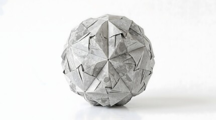 Geometric origami sphere made from folded gray paper on white background
