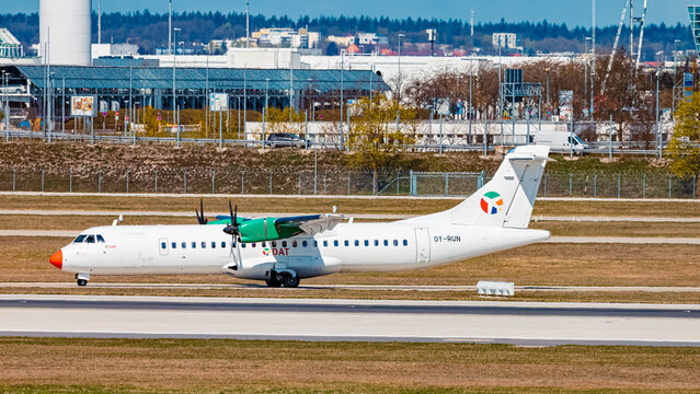 OY-RUN DAT ATR 72 passenger prop airplane on a sunny spring day at Munich airport, MUC, Freising, Bavaria, Germany