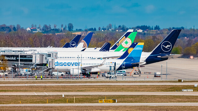 Passenger jet airplanes on a sunny spring day at Munich airport, MUC, Freising, Bavaria, Germany