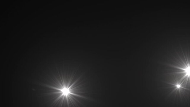 Photographer camera flashes. Random bright blinking lights. Flashing lens flares. Seamless loop