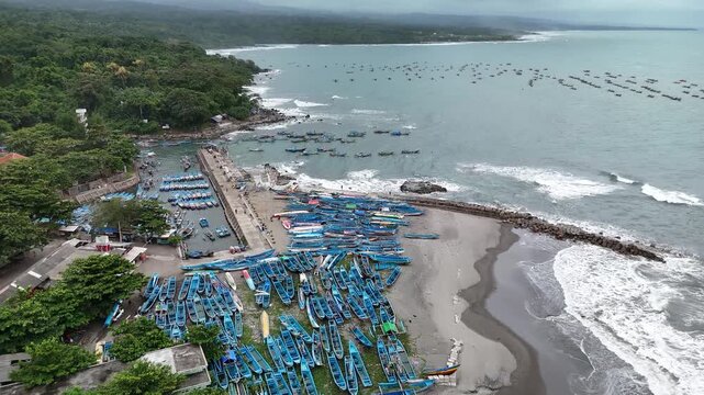 Ascending Drone View of Jayanti Fishing Harbor and Coastline in Cidaun West Java Indonesia