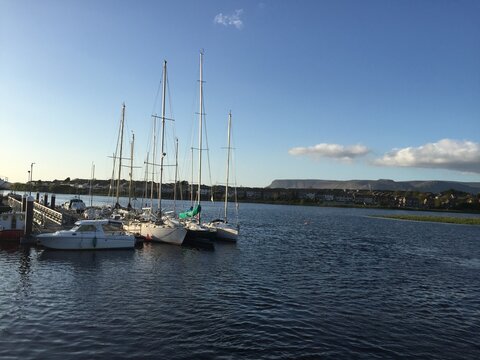 Sailboats moored on Sligo harbour with Benbulben mountain
