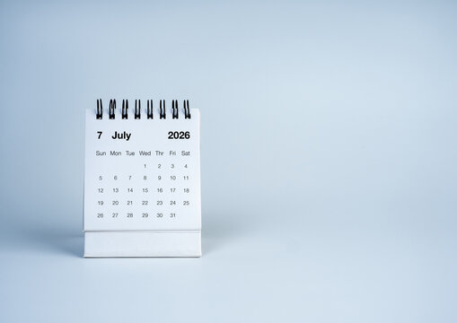 Minimal desk calendar displaying July 2026 on clean background, featuring schedule planning, time management, business organization, deadline tracking, appointment reminder, and copy space.