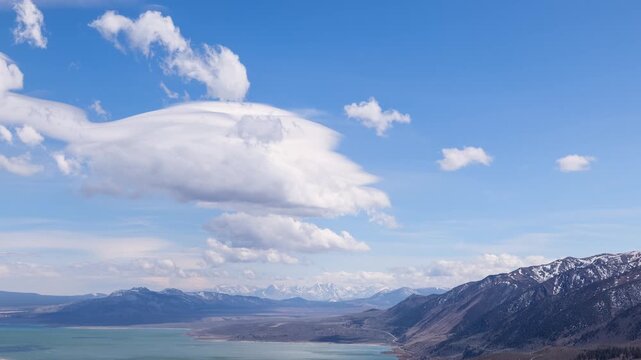 Time Lapse of the clouds moving above the salt water Mono Lake in California.