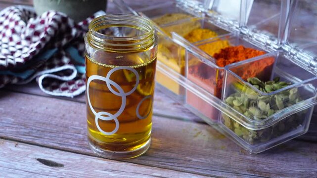 Herbal tea preparation with spices in kitchen setup