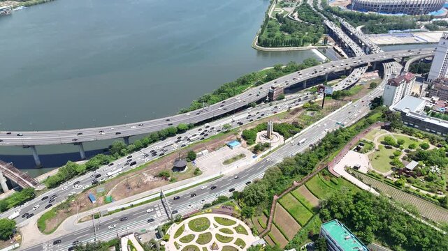 Static Drone Shot of Modern Riverside Apartment Complex, Urban Skyline and Residential Towers Near Han River