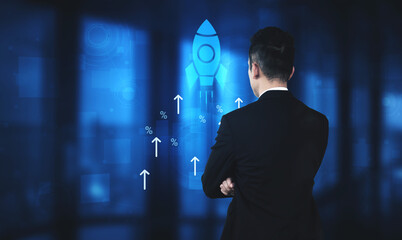 A businessman stands in a modern office, gazing at a digital representation of a rocket launch, symbolizing growth and innovation in today fast-paced market. Cyphers © InfiniteFlow